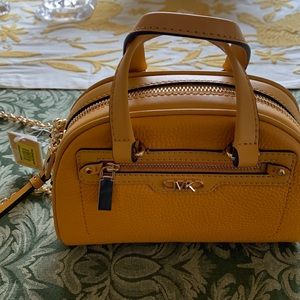 Michael Kors dome leather purse. Brand new, tags still attached.